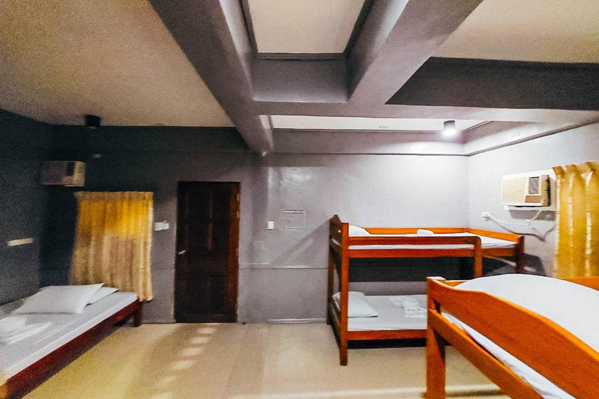 Mbg Travellers Inn Powered By Cocotel Puerto Princesa Room photo