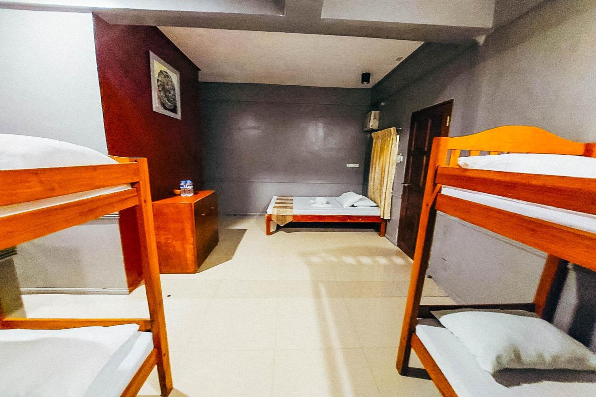Mbg Travellers Inn Powered By Cocotel Puerto Princesa Room photo