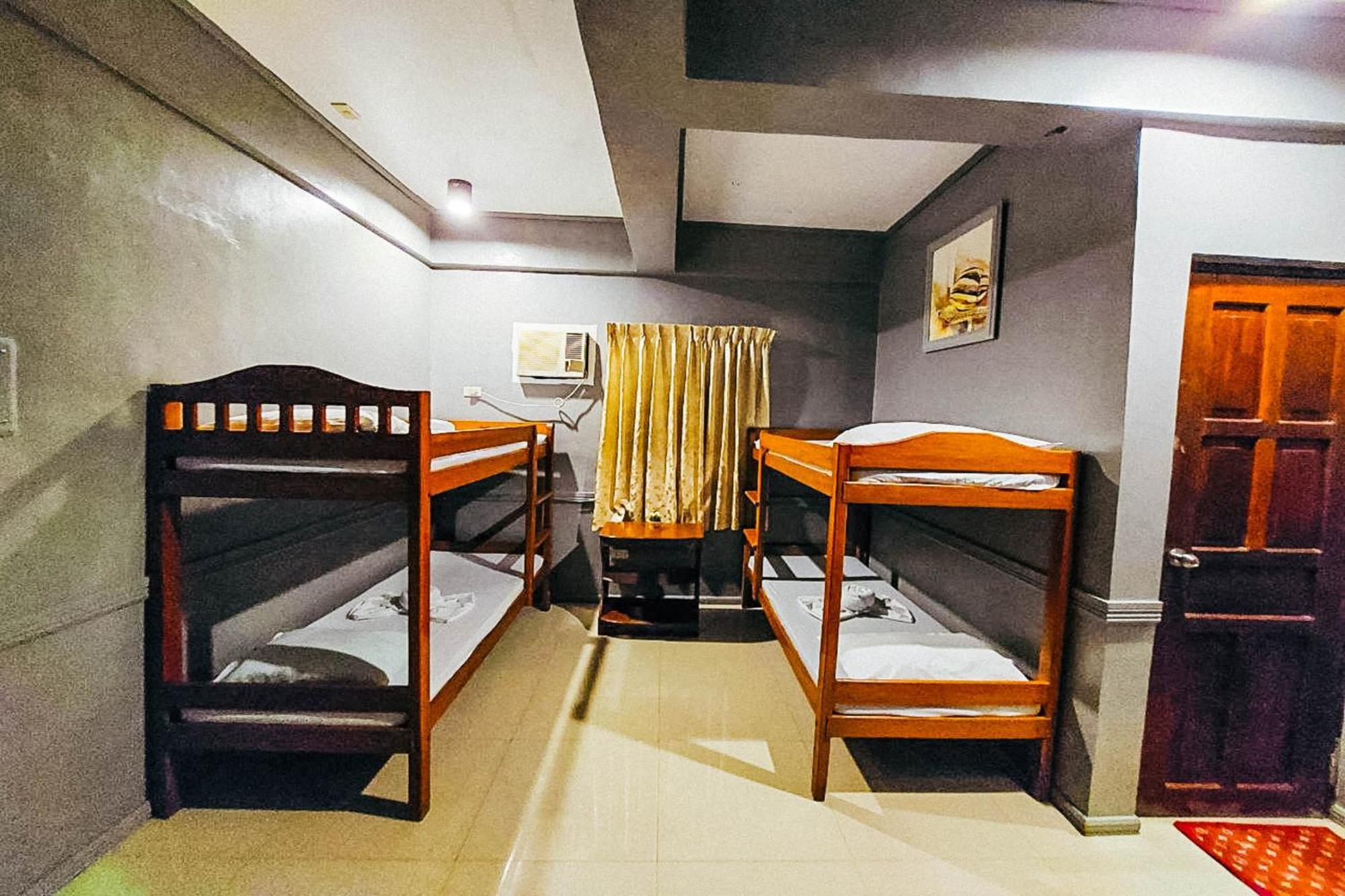 Mbg Travellers Inn Powered By Cocotel Puerto Princesa Room photo