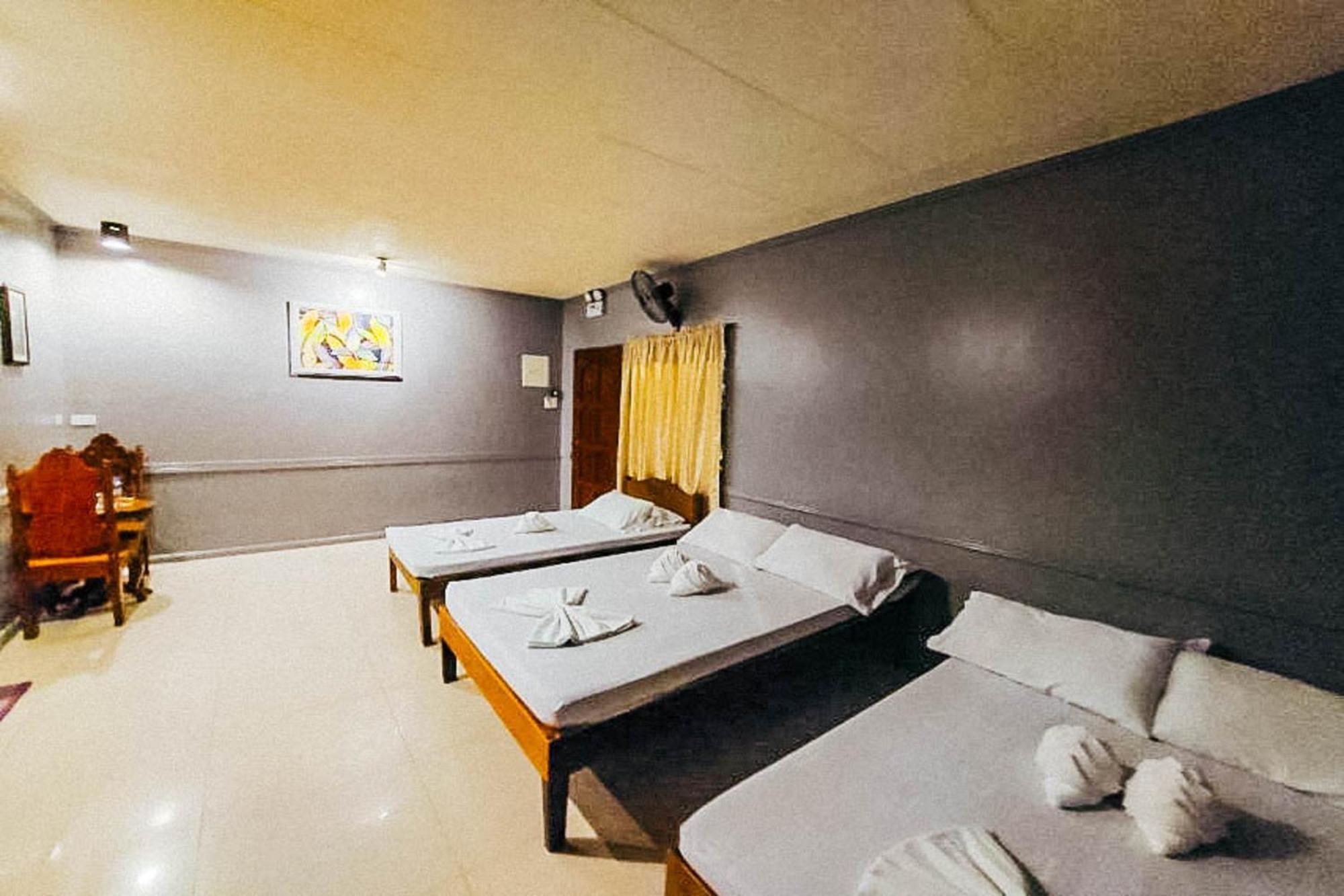 Mbg Travellers Inn Powered By Cocotel Puerto Princesa Room photo