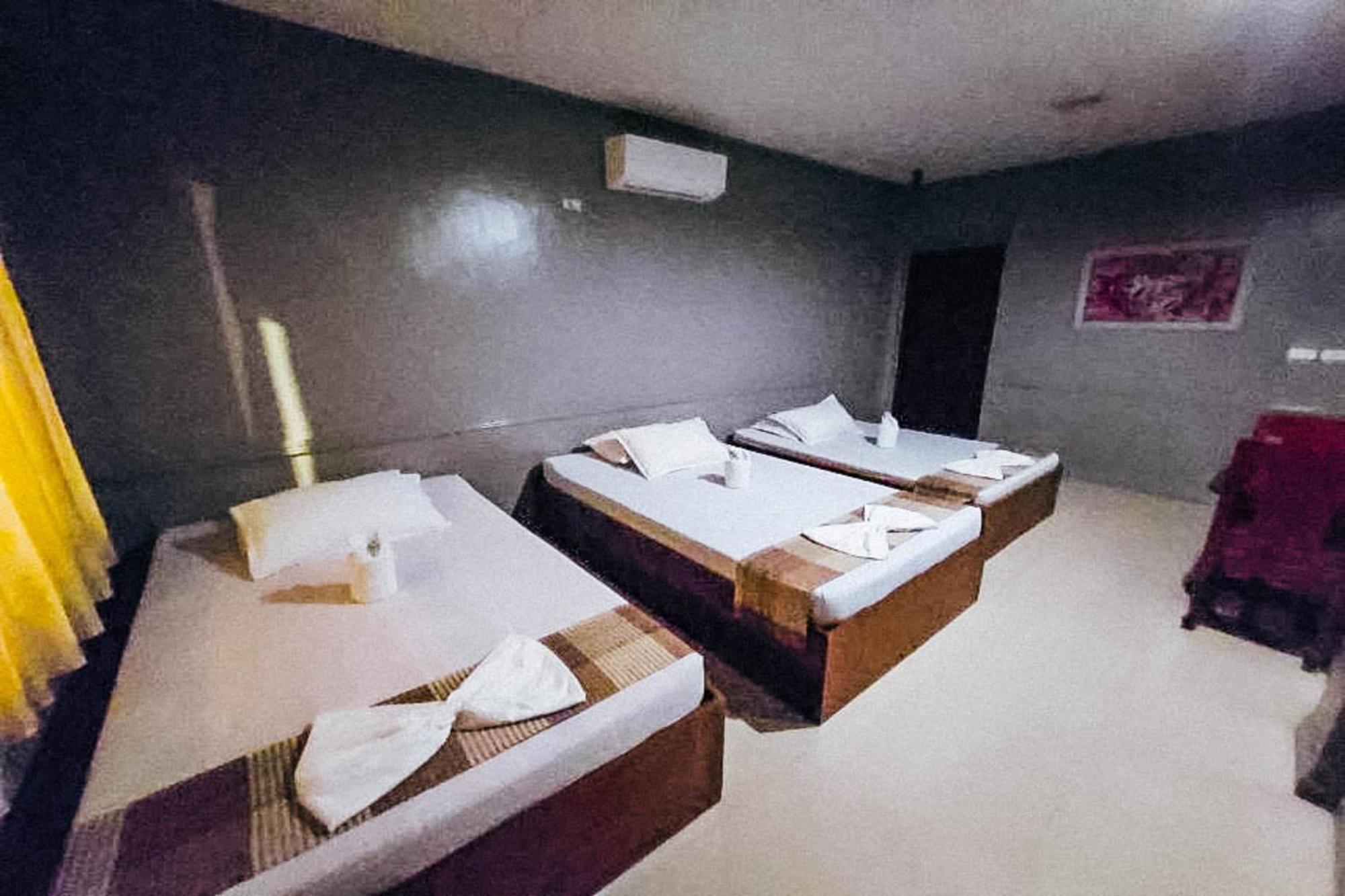 Mbg Travellers Inn Powered By Cocotel Puerto Princesa Room photo