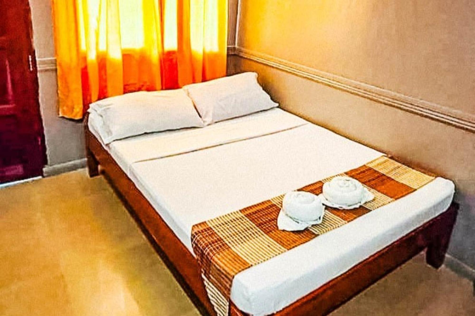 Mbg Travellers Inn Powered By Cocotel Puerto Princesa Room photo