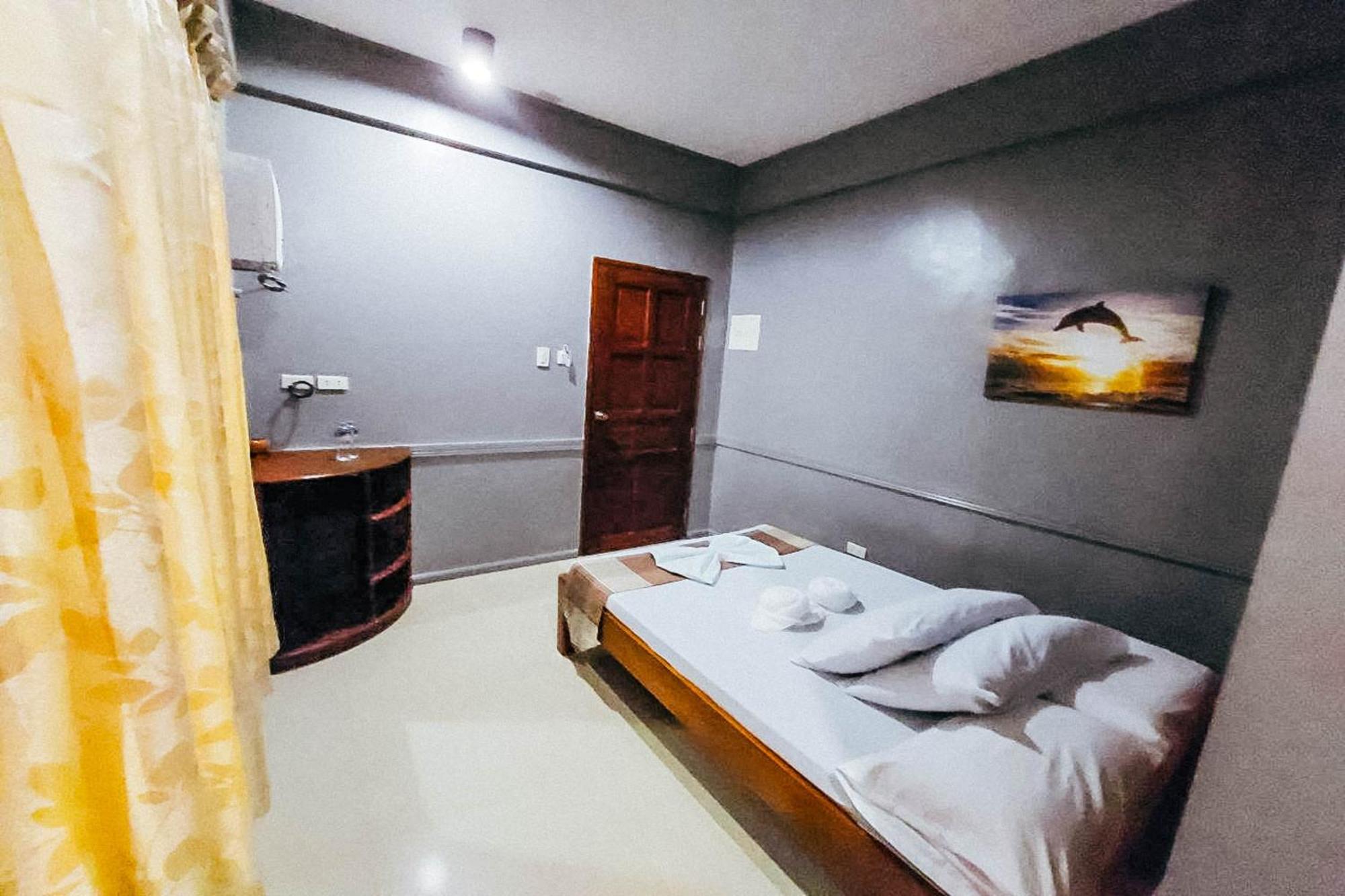 Mbg Travellers Inn Powered By Cocotel Puerto Princesa Room photo