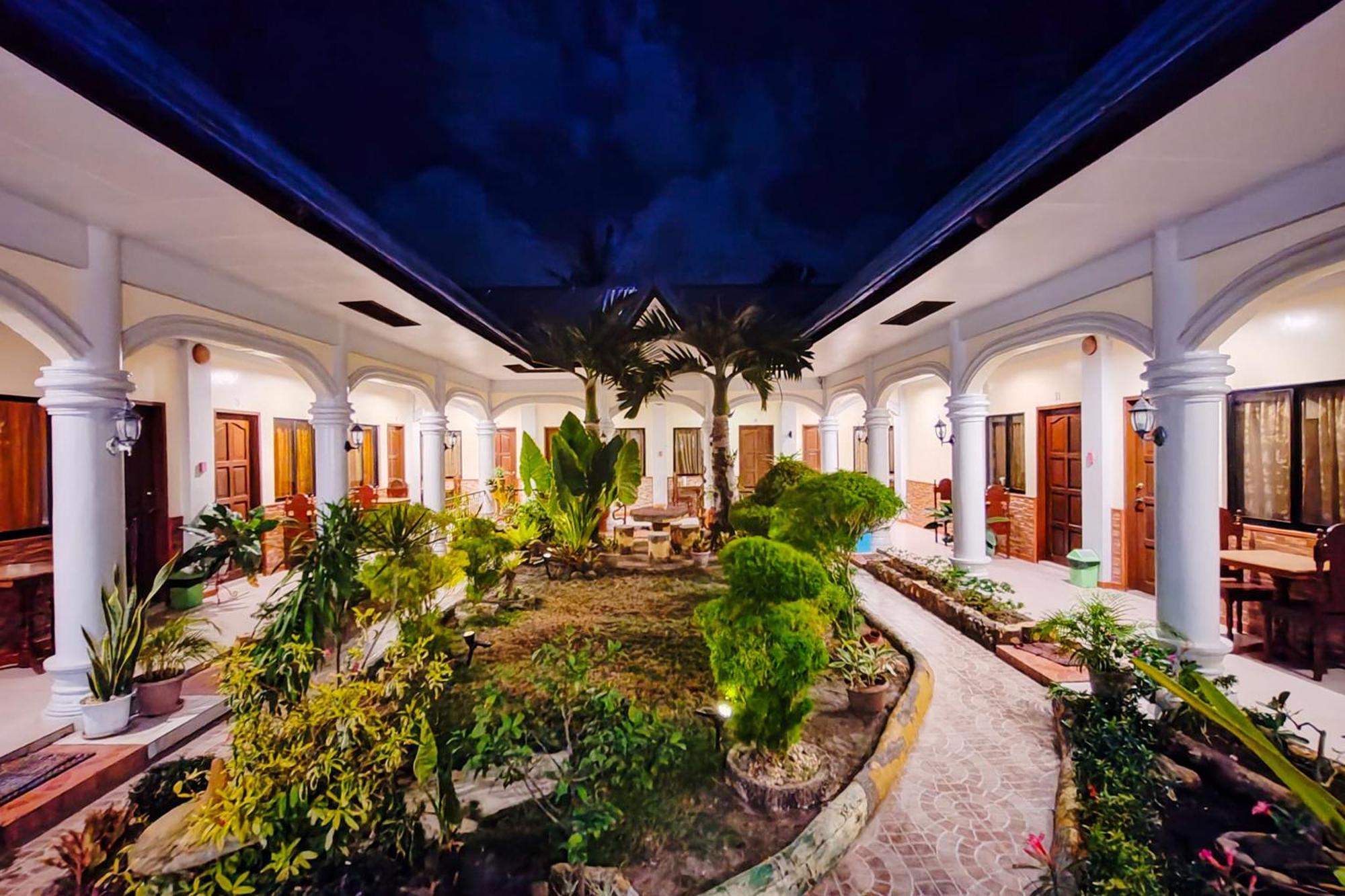 Mbg Travellers Inn Powered By Cocotel Puerto Princesa Exterior photo