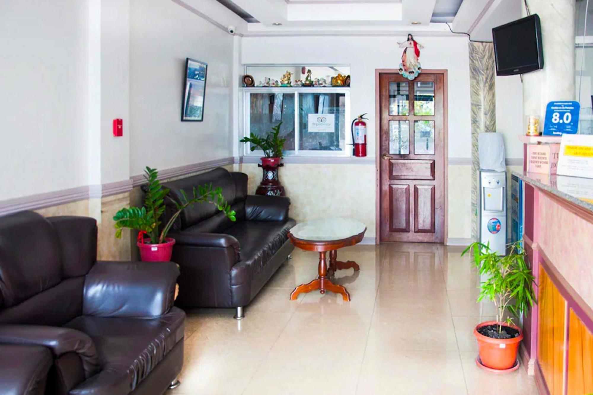 Mbg Travellers Inn Powered By Cocotel Puerto Princesa Exterior photo