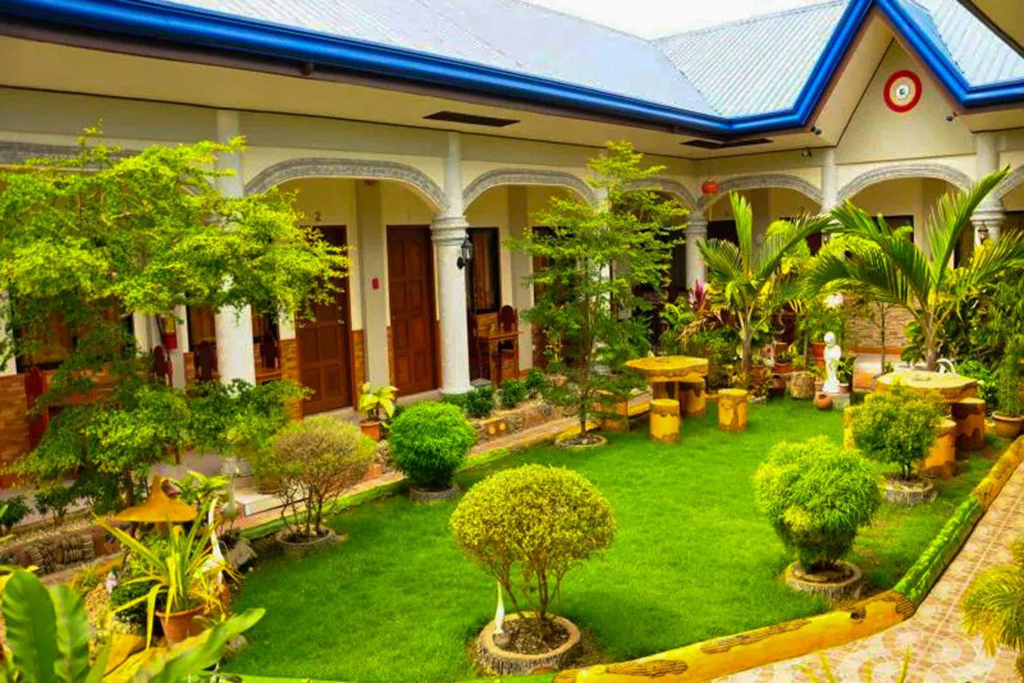 Mbg Travellers Inn Powered By Cocotel Puerto Princesa Exterior photo