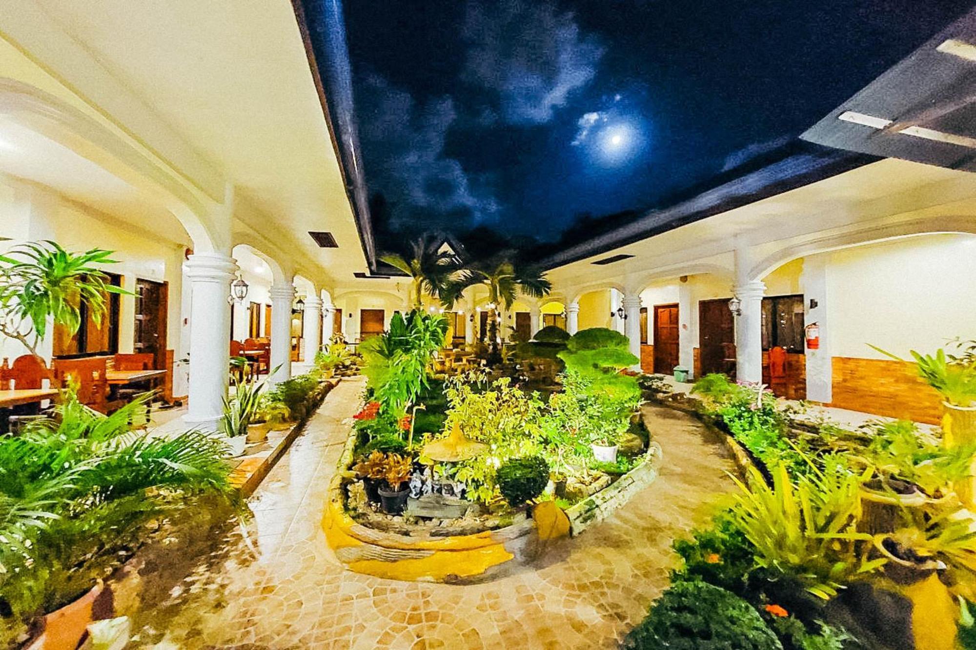 Mbg Travellers Inn Powered By Cocotel Puerto Princesa Exterior photo
